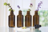 45659456 - brown bottle  with aromatic herbs for essential oil